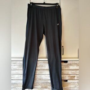 Aasics track pants. Size M.Grey with blue trim. Excellent condition.